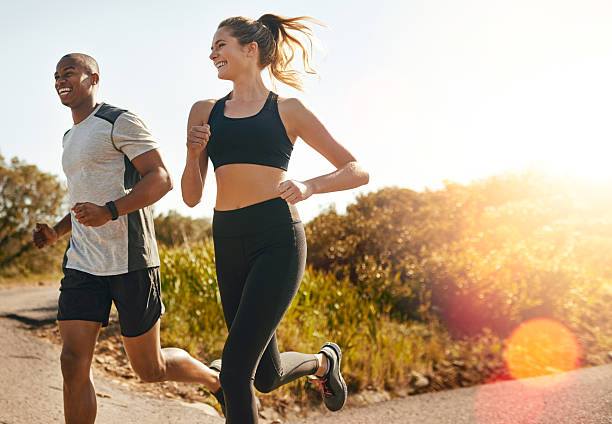 Shot of a fit young couple going for a run outdoors|||